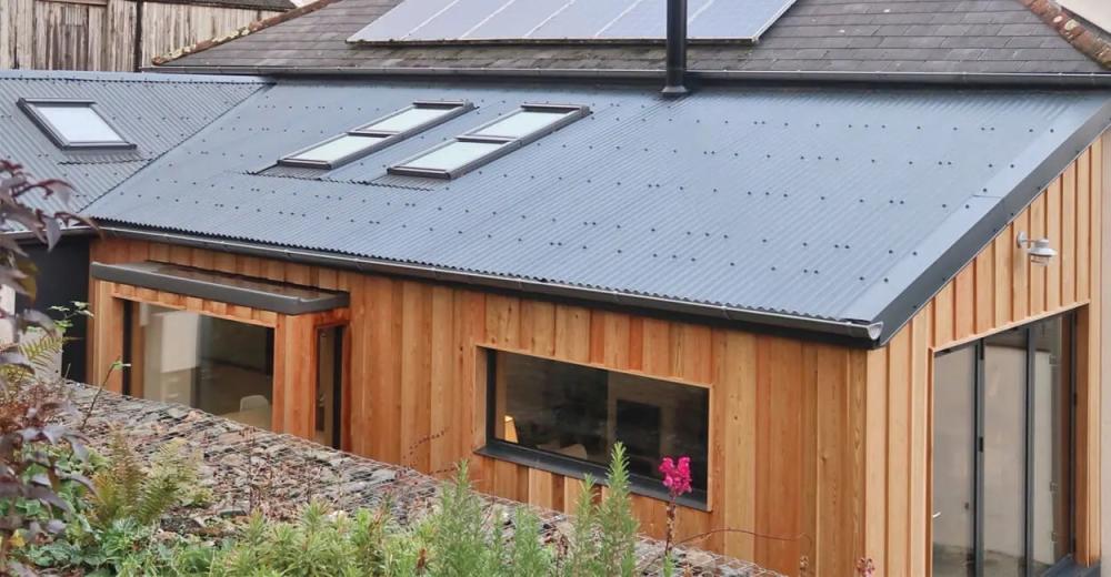 Example of a lean-to extension using a single sided, Corrugated pitched roof