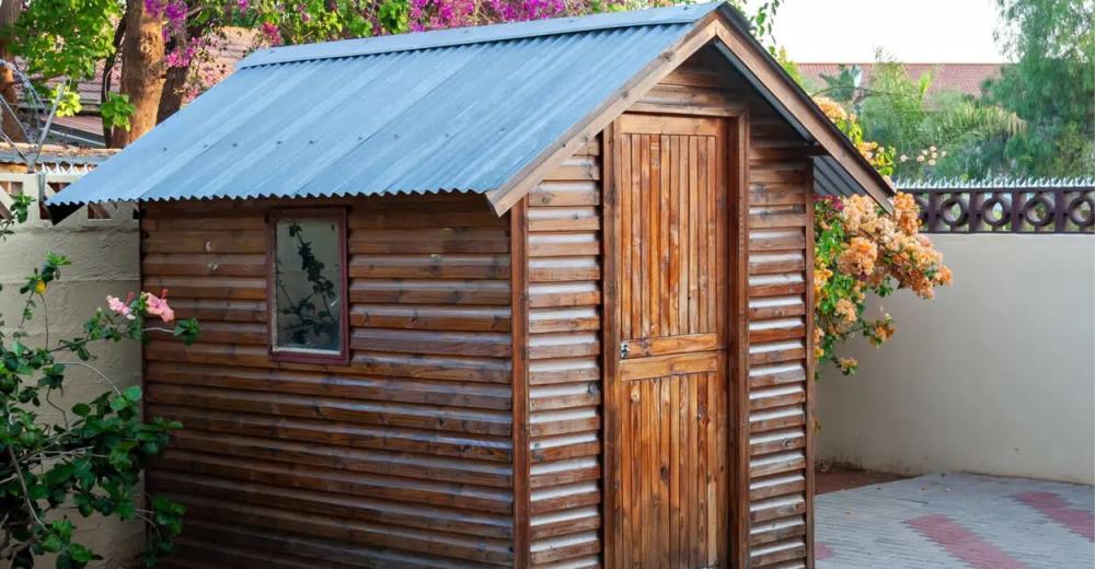 An example of a dual pitched roof installed using metal roofing sheets