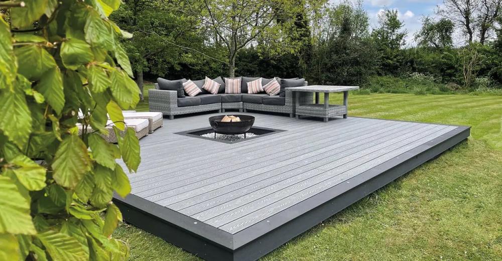 Contrasting Coloured Decking creates a frame effect on this seating area.