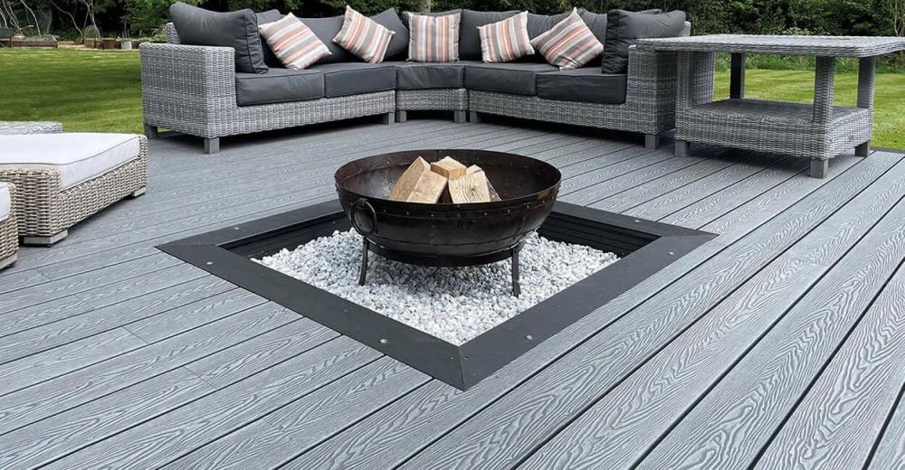Contrasting Coloured Decking creates a frame effect on this seating area.