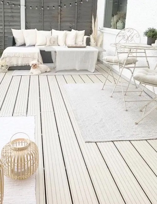 Outside decking with an outdoor rug