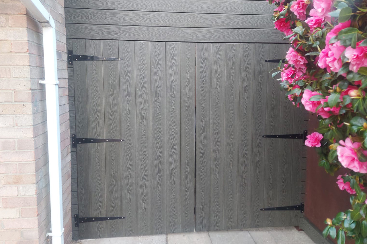 A homeowner has used Cladco Composite Woodgrain Decking for a garage gate 