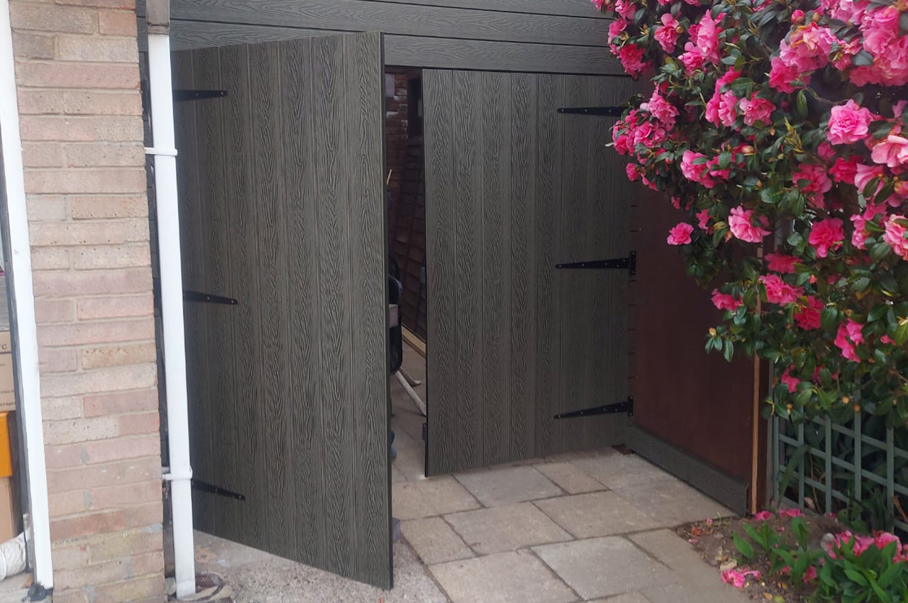 A homeowner has used Cladco Composite Woodgrain Decking for a garage gate