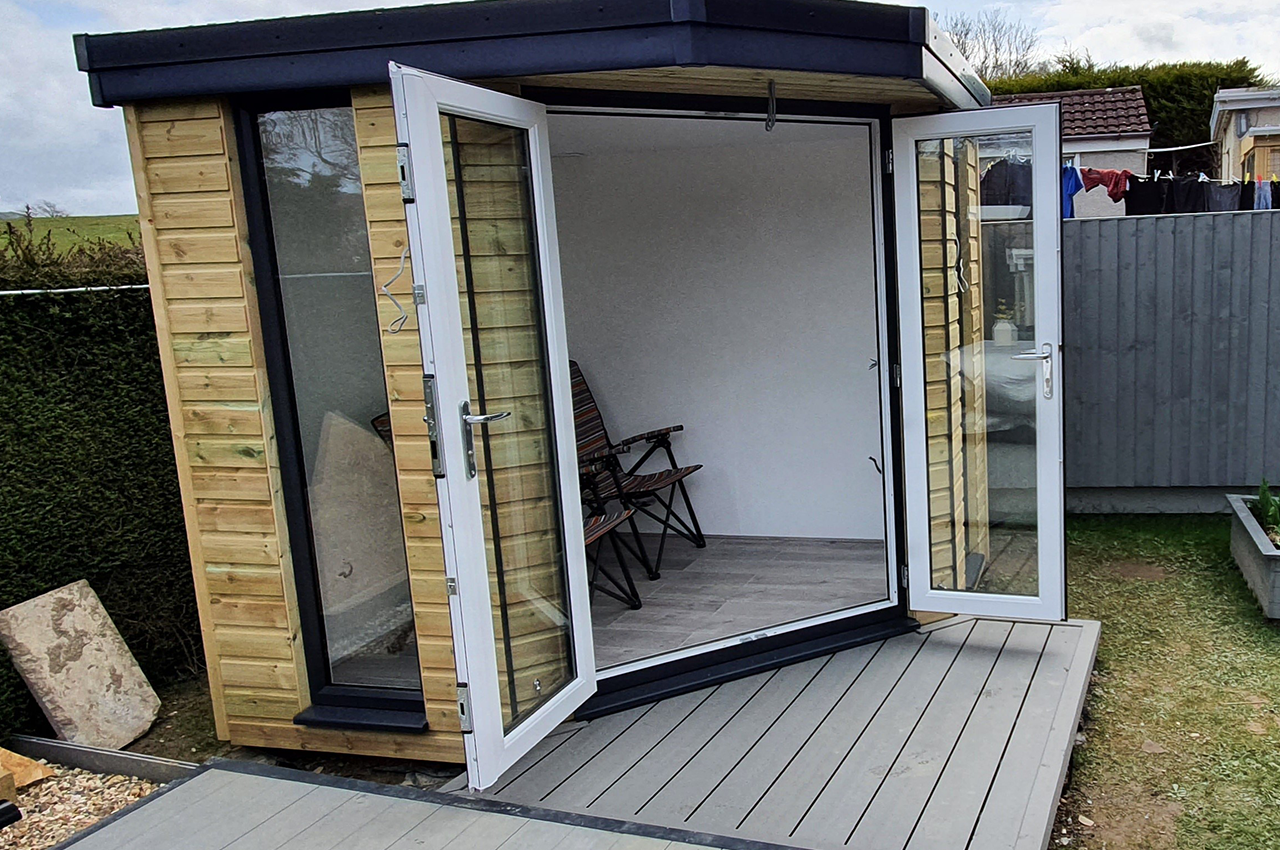 The entrance to this garden room was designed using Cladco Decking® in Stone Grey
