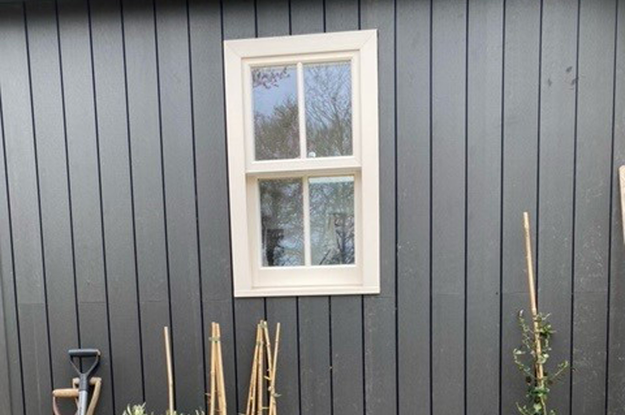 Composite Cladding creates a vertical exterior for this garden building