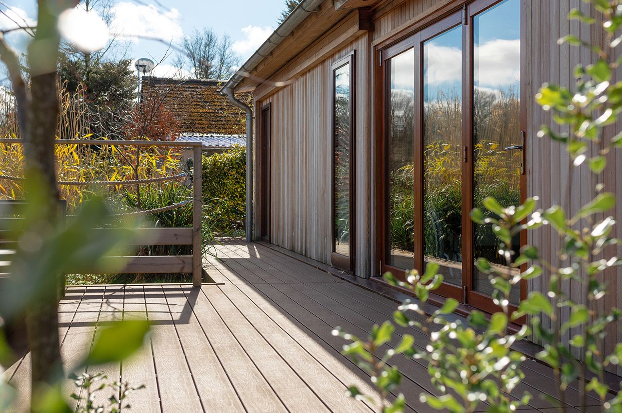 Create the perfect exterior retreat with Cladco Composite Decking Boards in Light Grey and Charcoal
