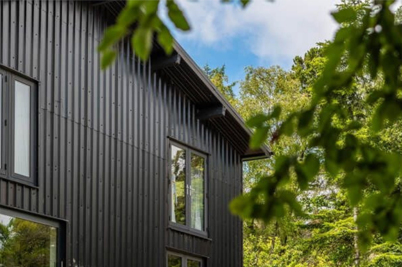 Cladco 32/1000 Box Profile Roofing Sheets in Black protect this modern self-build home, The Spinney