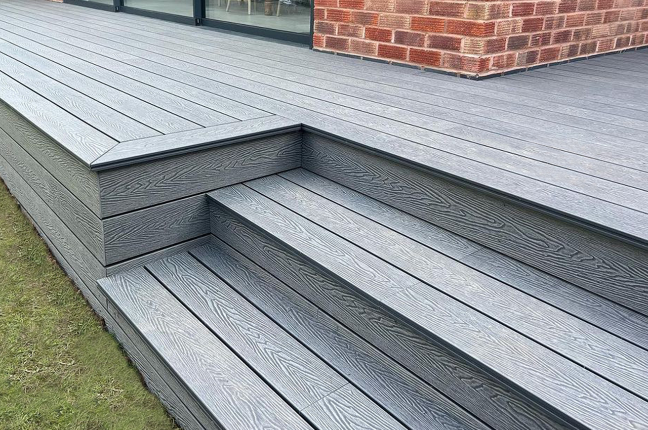 Garden area with Stone Grey Composite Woodgrain Decking Boards