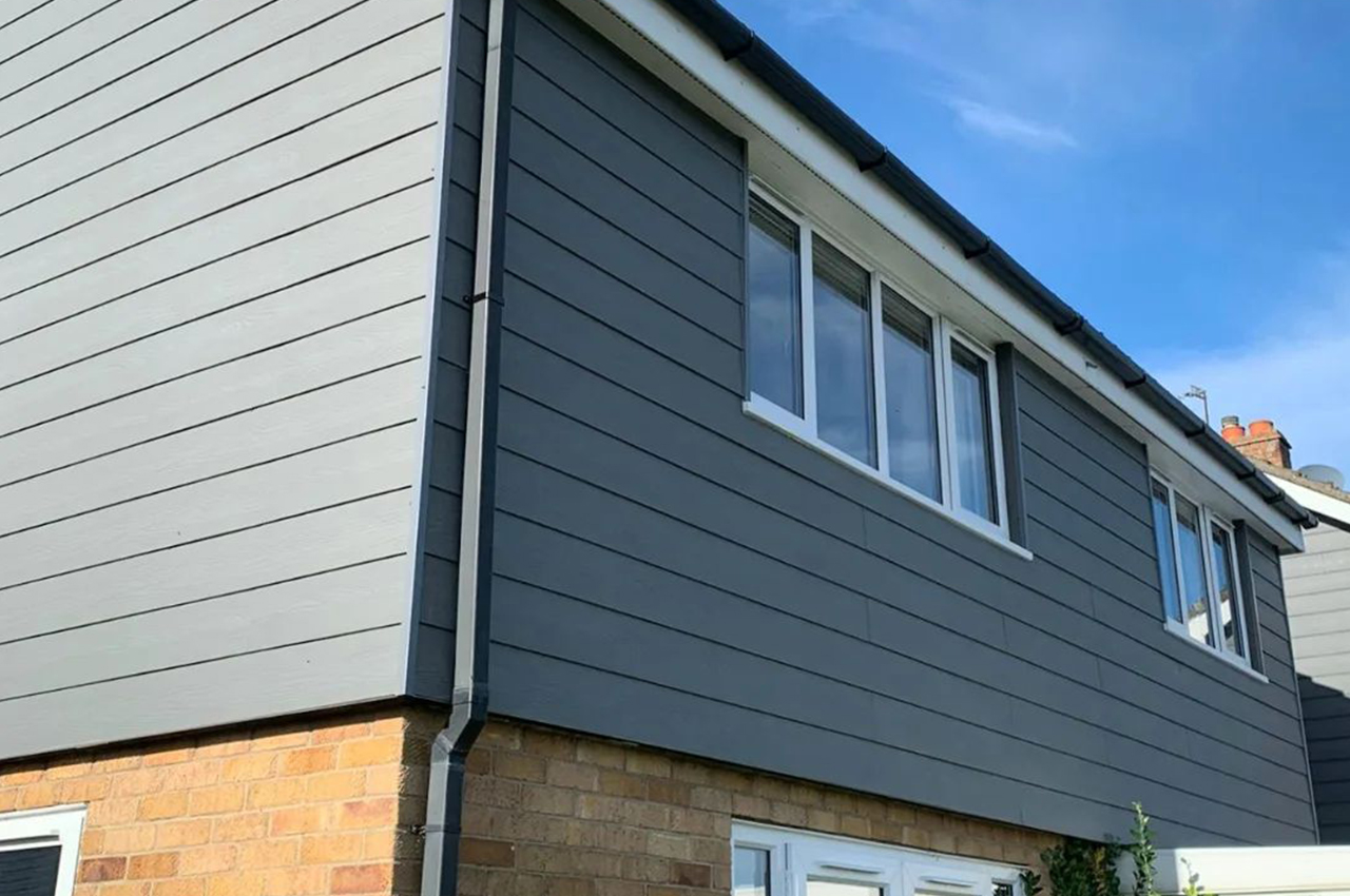 Upgraded home exterior with Cladco Fibre Cement Cladding in Slate.