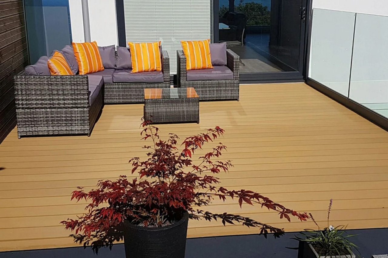 Three Story Contemporary House with Two Decked Areas in Teak and Charcoal.