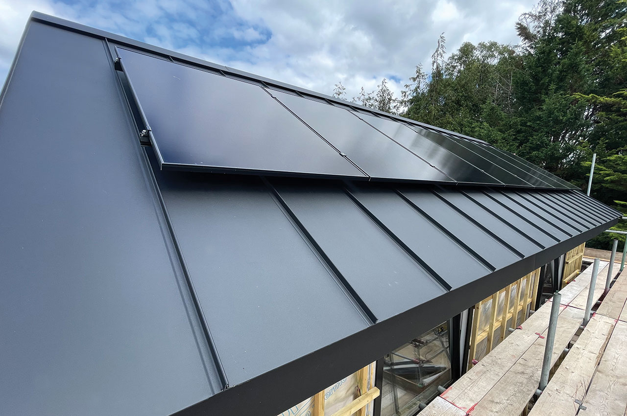 Contemporary Roof with Solar Panels and Roof Windows | Slate Grey Standing Seam Sheets
