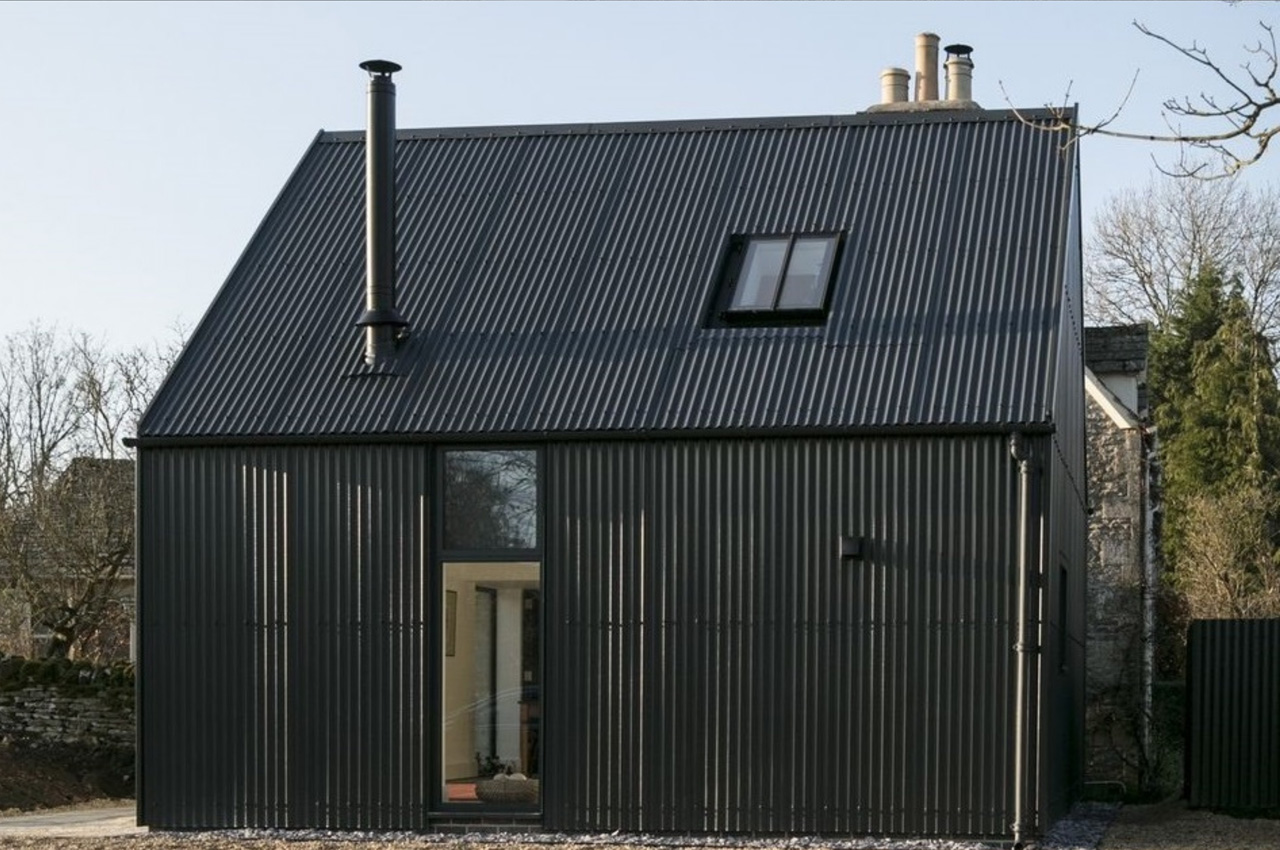 Corrugated Sheets in Anthracite with custom flashing detail around edging