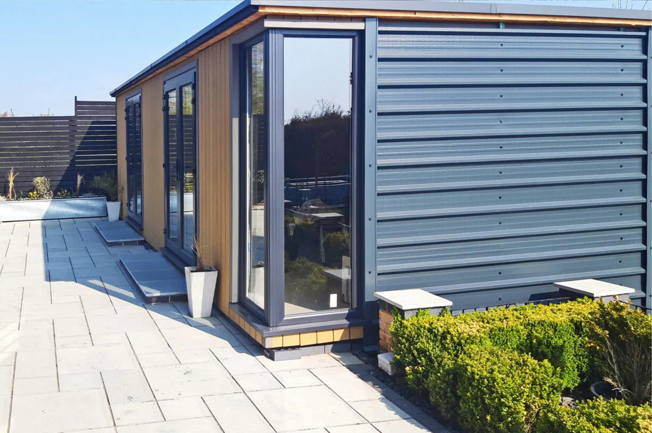 A modern garden building has been designed using 32/1000 Box Profile Roofing Sheets as side cladding