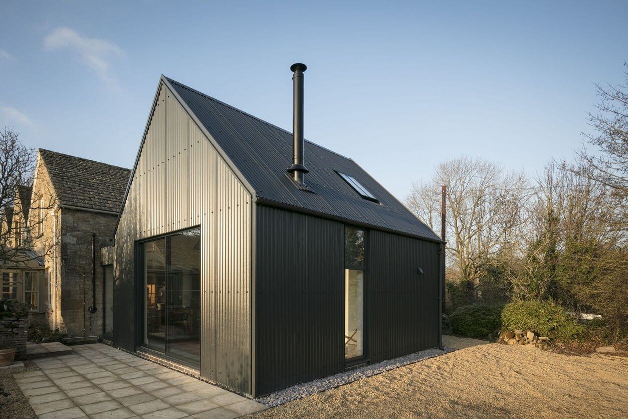 Corrugated Sheets in Anthracite with custom flashing detail around edging