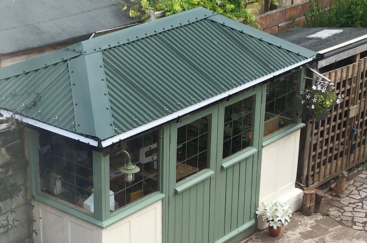 Juniper Green Corrugated Roofing Sheets on garden potting shed