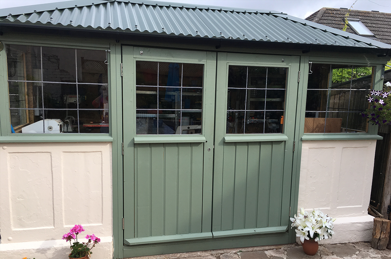 Juniper Green Corrugated Roofing Sheets on garden potting shed