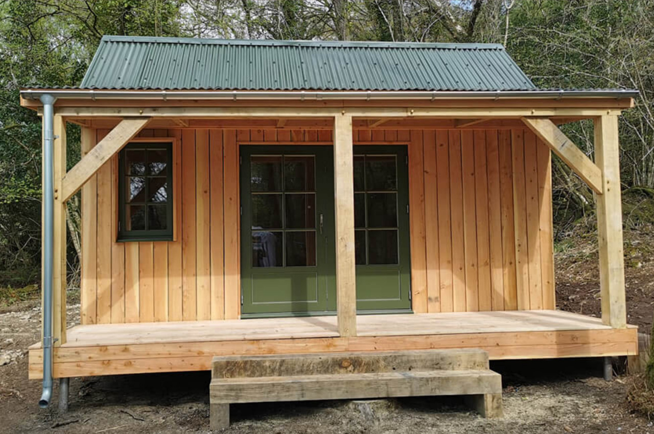 Off-grid woodland cabin featuring Cladco Corrugated Roof Sheets