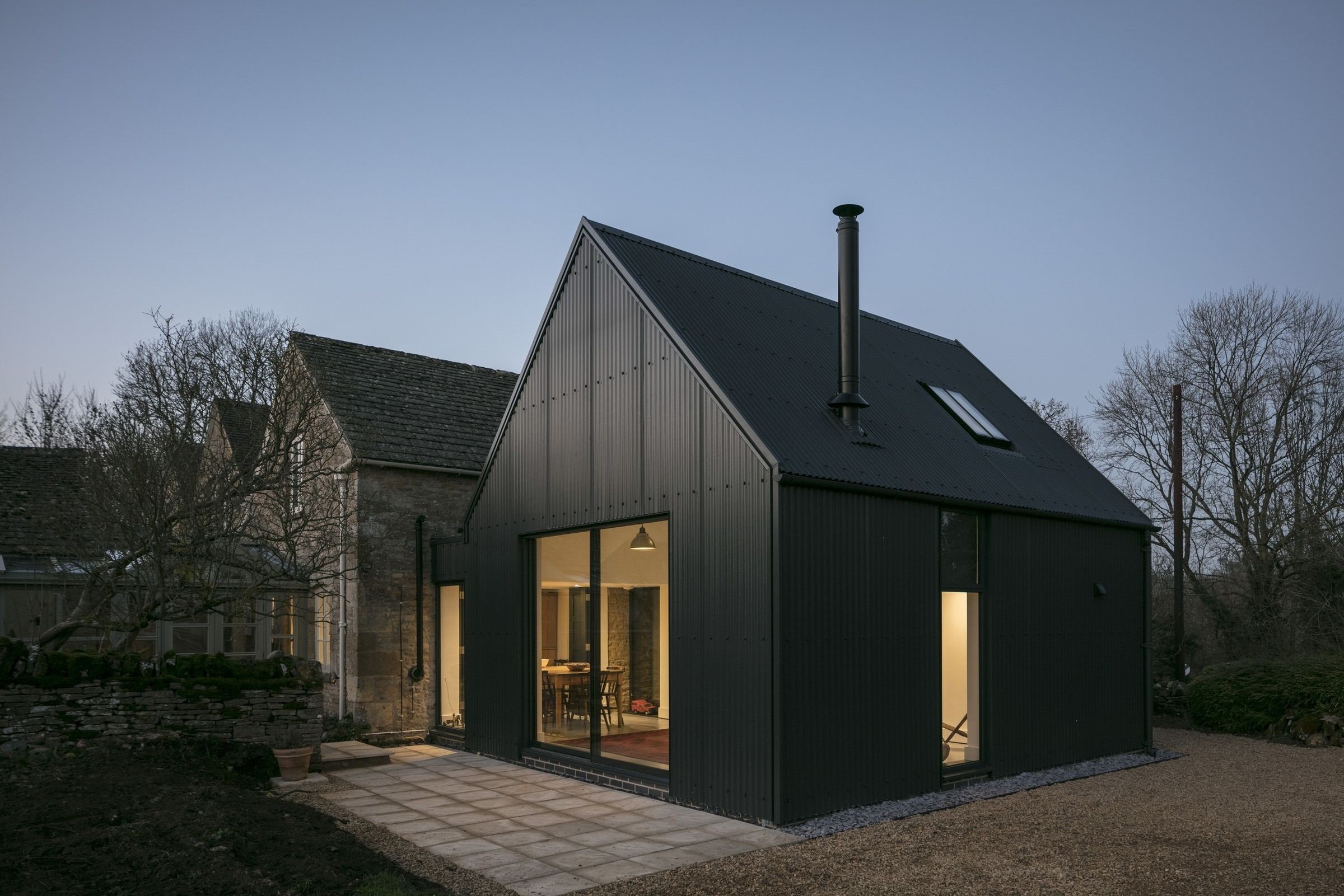 Corrugated Sheets in Anthracite with custom flashing detail around edging