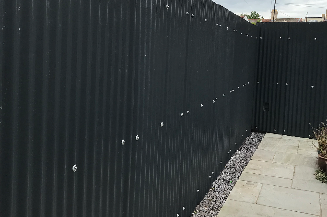 Black Corrugated Cladding Sheets in garden