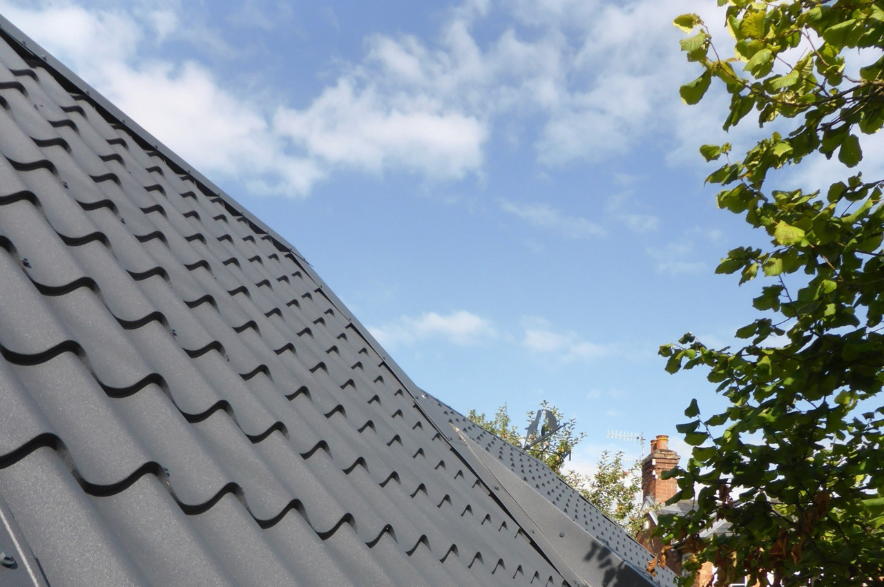 Slate Grey Tile form sheeting on stone barn 