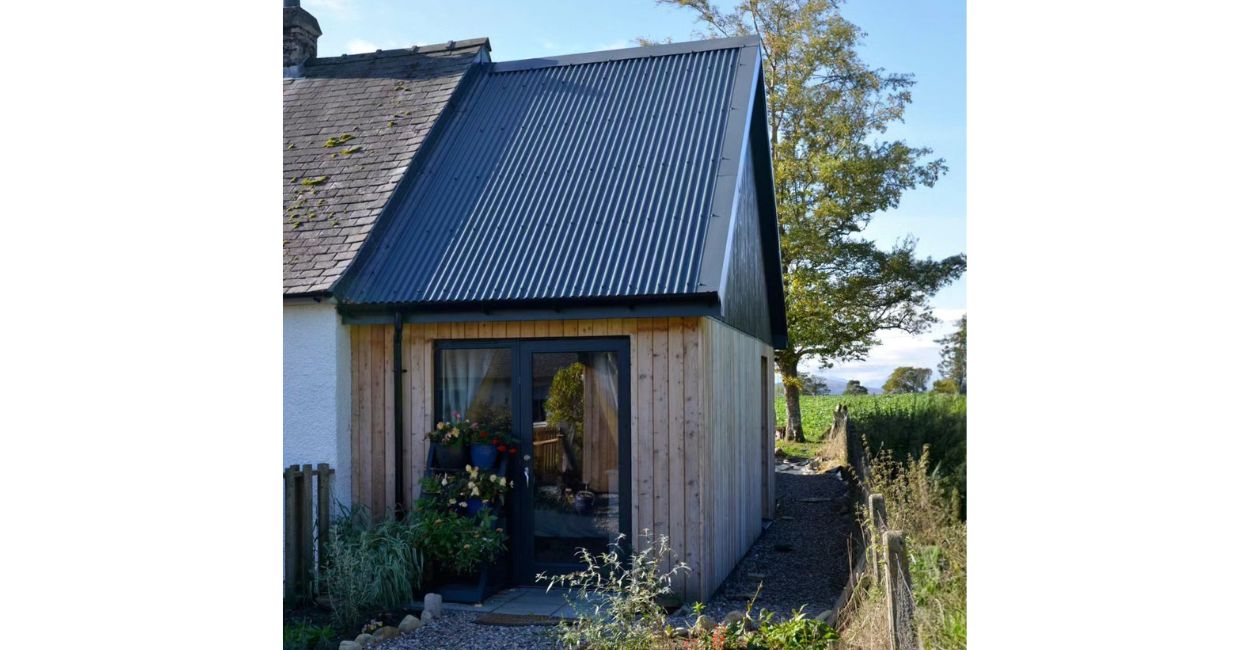 Home extension featuring Cladco 13/3 Corrugated Roof with Anthracite PVC Plastisol Coating