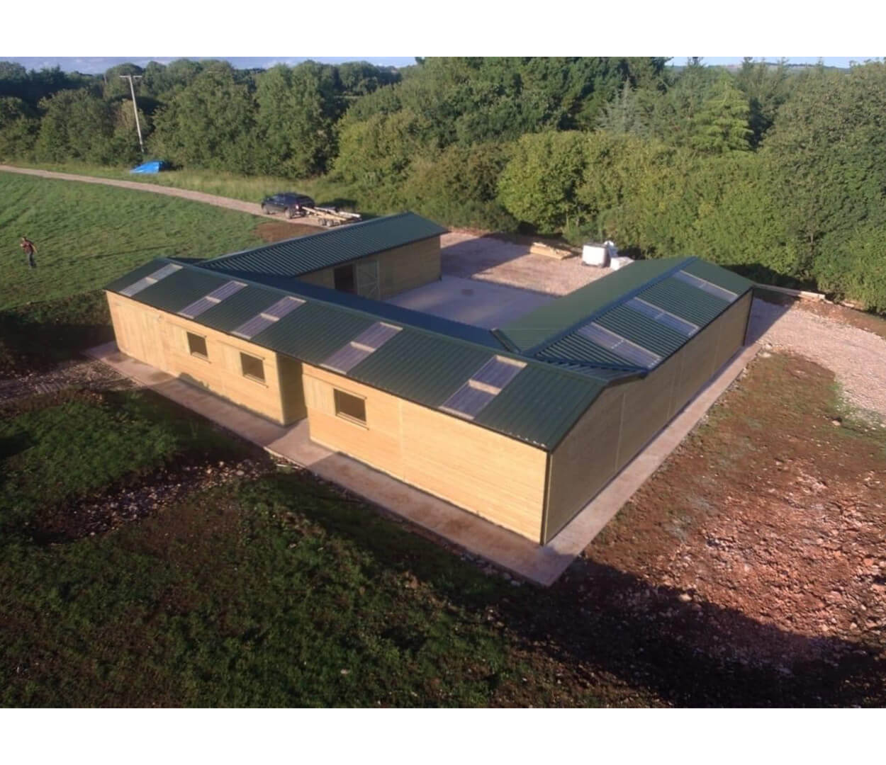 PVC Juniper Green roofing sheets give this stables a modern, yet culturally sound look without impeaching on the surrounding countryside