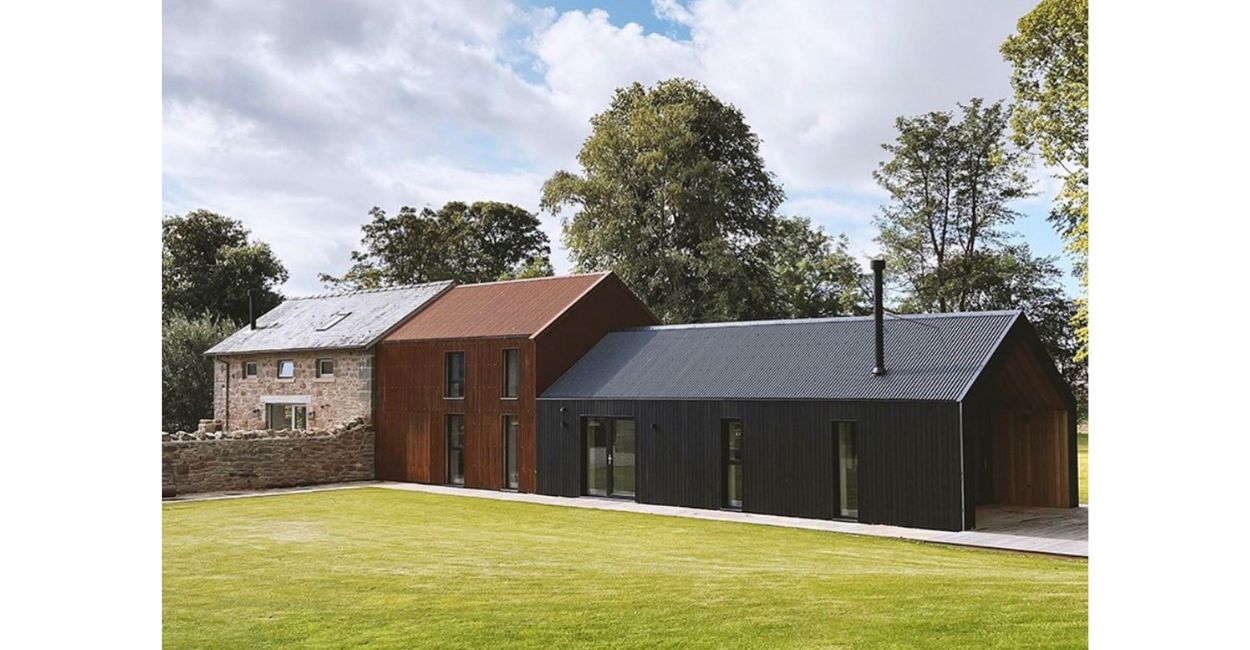 Barn conversion featuring Cladco 13/3 Corrugated Roofing with Black PVC Plastisol Coating
