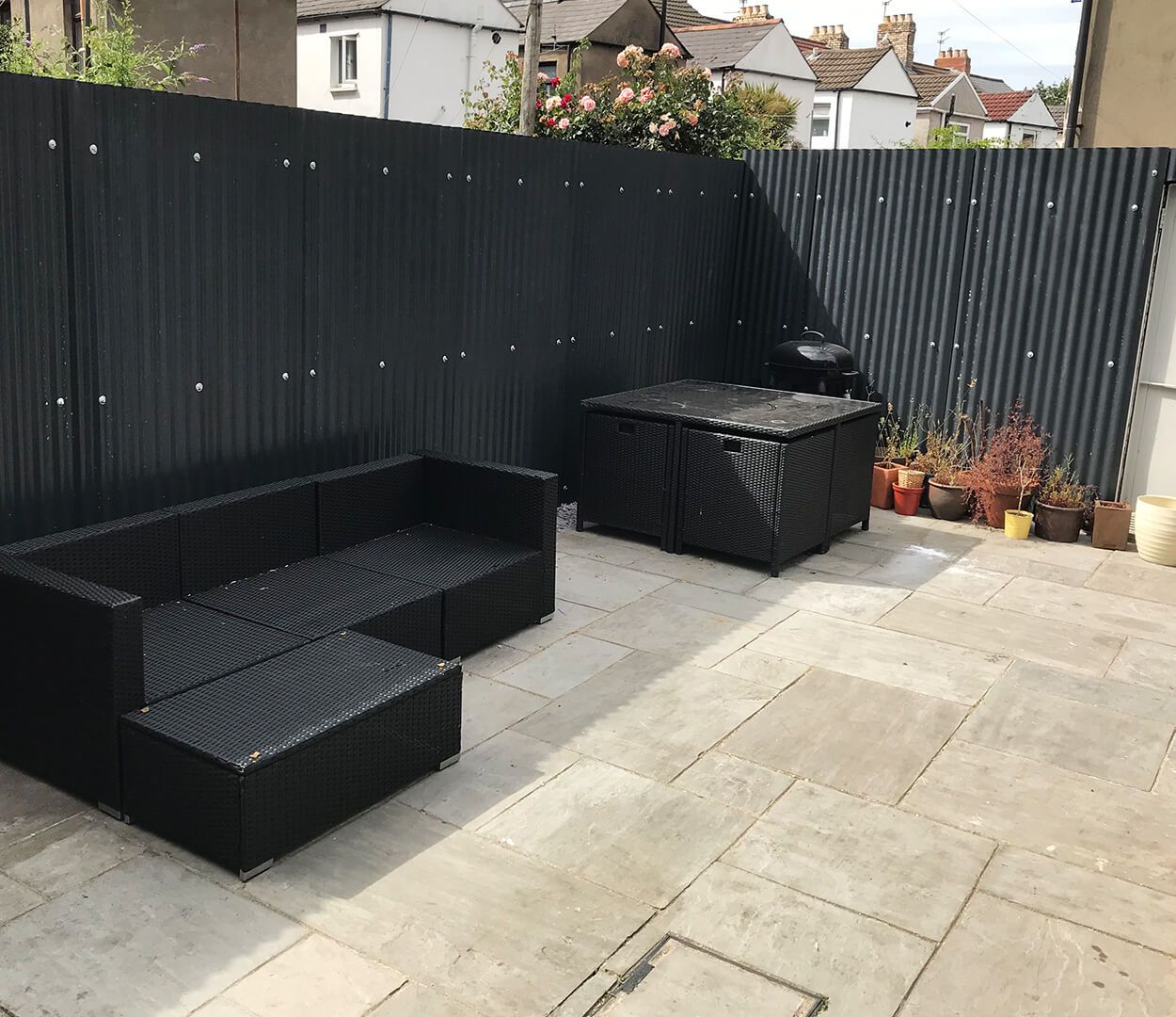 Black Corrugated Cladding Sheets in garden