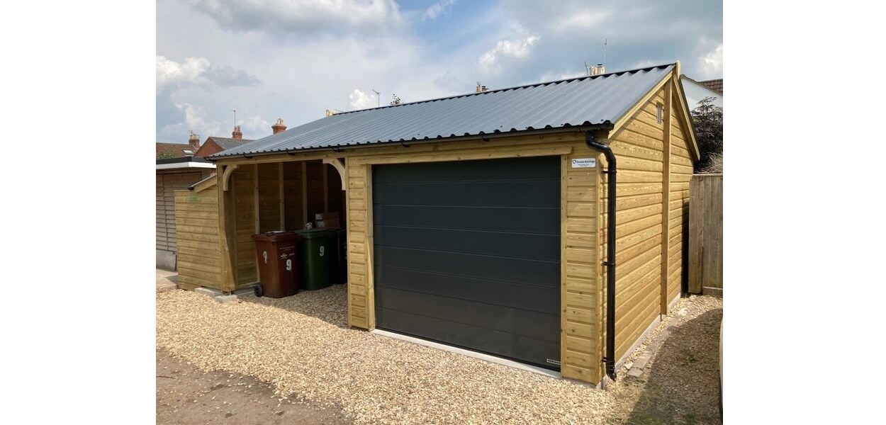 Cladco 34/1000 Box Profile Roofing Sheets protect this garage carport building