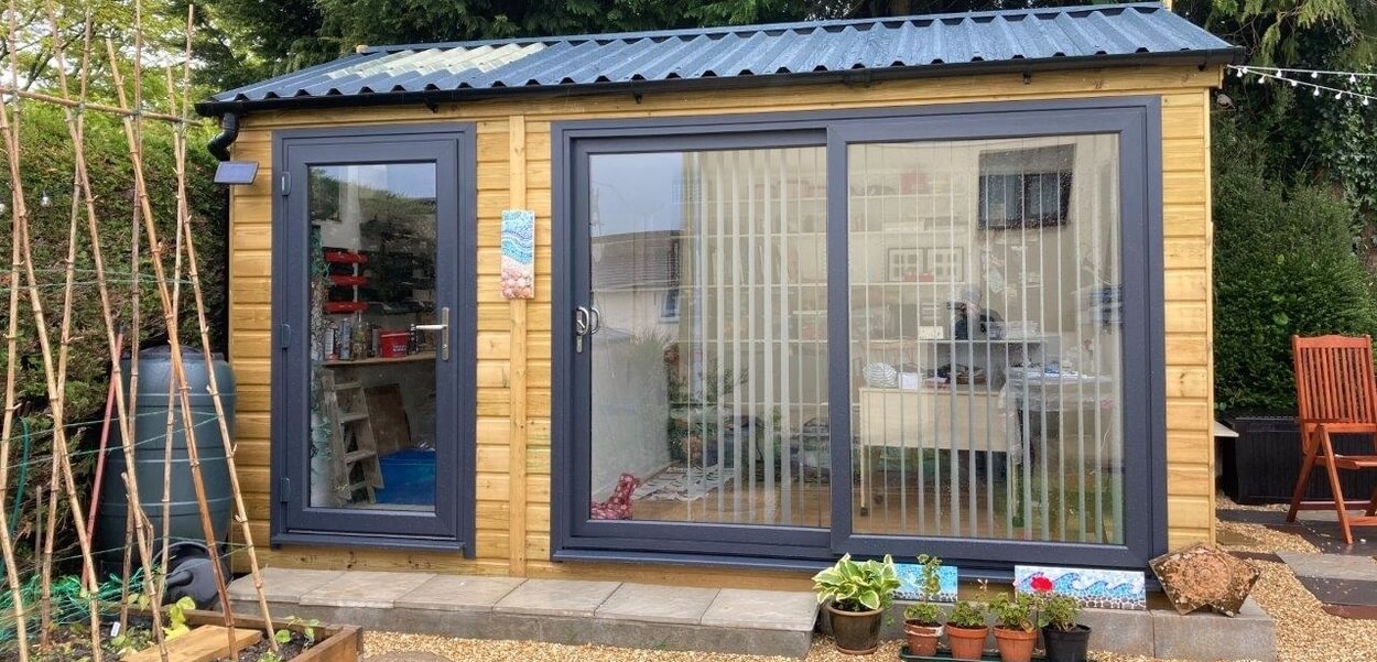 34/1000 Roofing Sheets used on an attractive garden studio