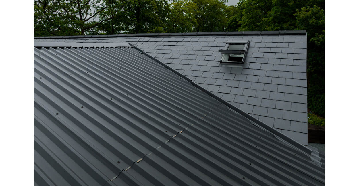 Cladco 32/1000 Box Profile Roofing Sheets in Black protect this modern self-build home, The Spinney
