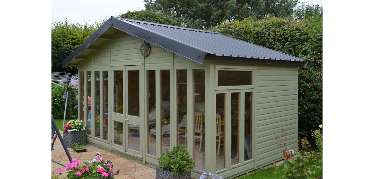A modern garden room designed using Cladco 34/1000 Roofing Sheets in Anthracite