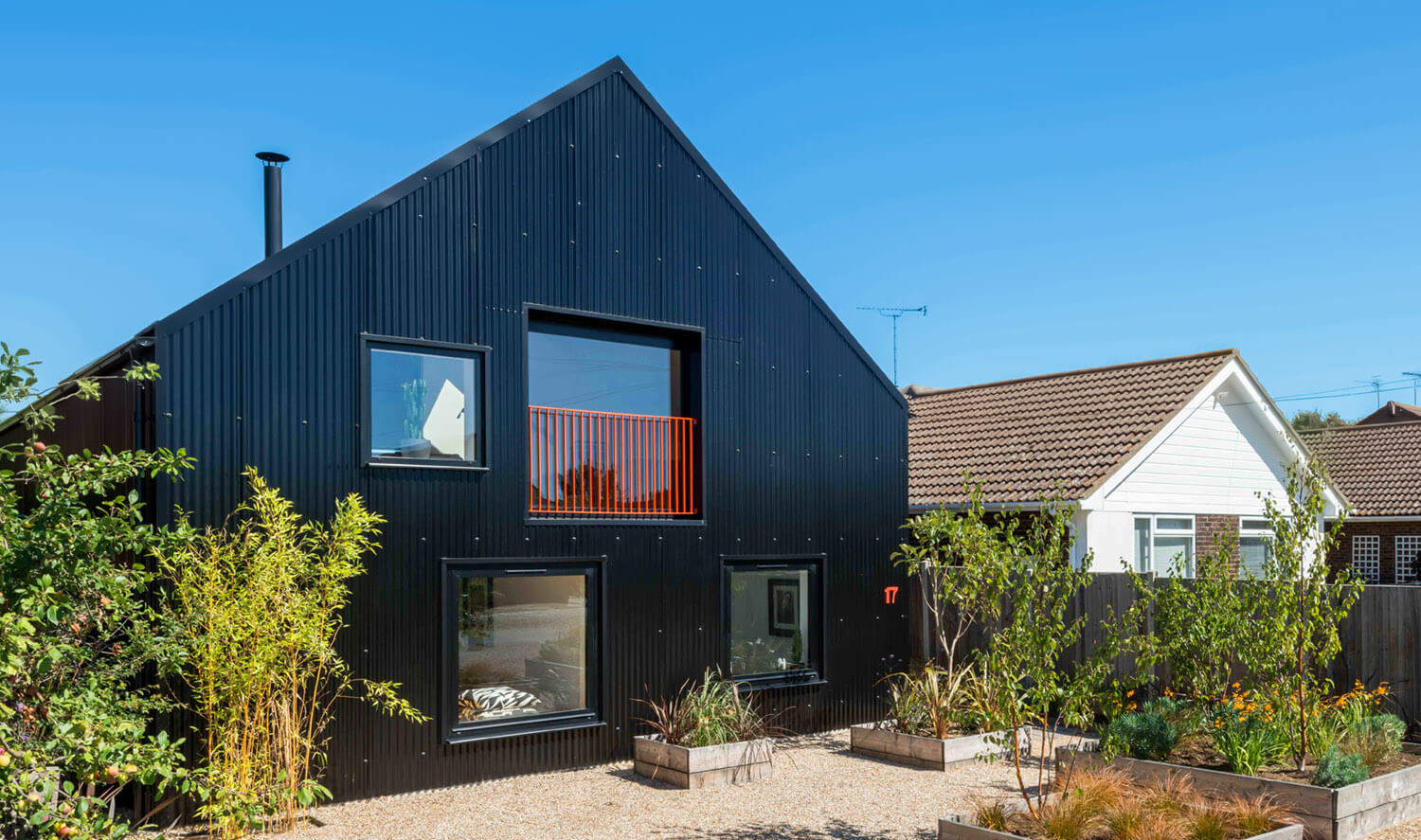 A bold, low-maintenance exterior created using Cladco Corrugated Roofing Sheets