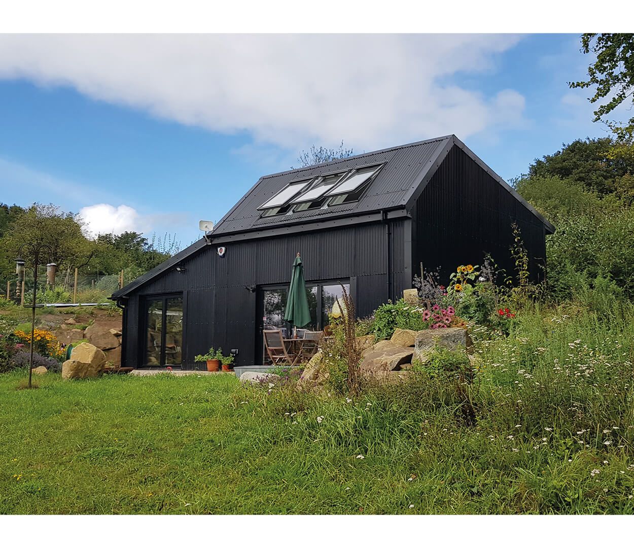 Cladco Corrugated Roofing Sheets In Black Give This Build Both Symmetry and Beauty