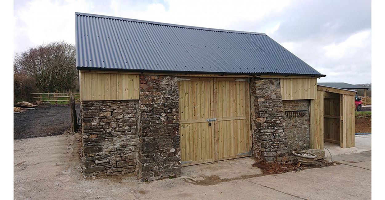 Before and after of stone barn with Anthracite PVC Corrugated Sheeting