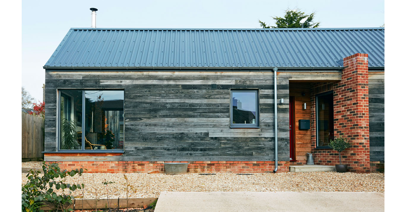 A Scandinavian-inspired rural home features Cladco Steel Box Profile Roofing Sheets 