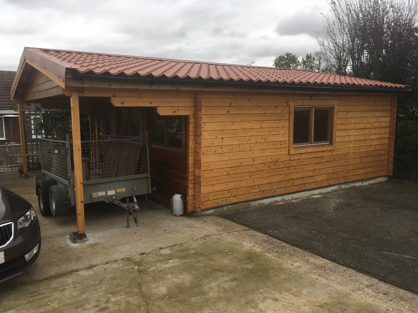Cladco Profiles Tileform Roofing sheets in Copper match perfectly with the rustic timbre of this customer’s workshop
