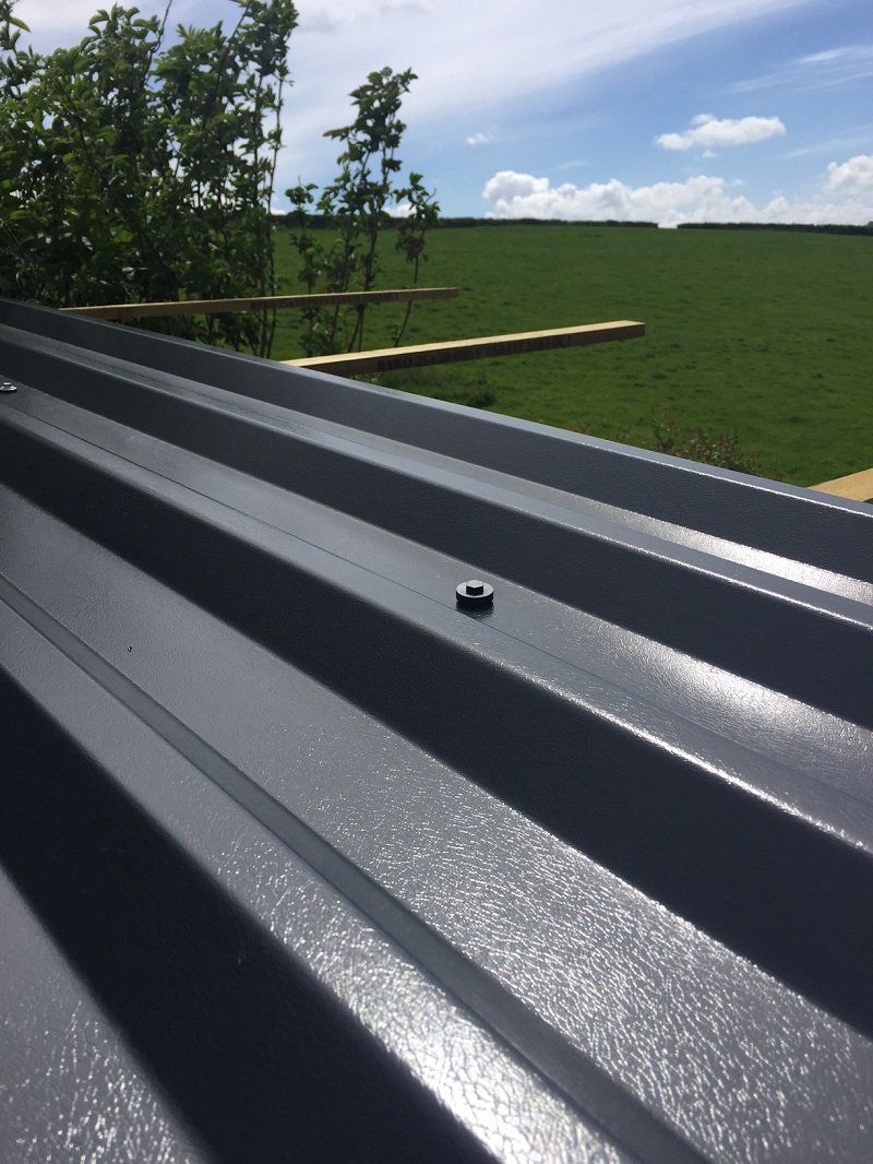 The Difference Between PVC and Polyester Roofing Sheets