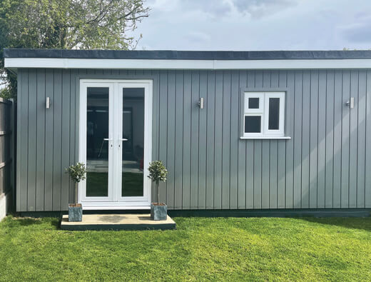 Cabin with Cladco Composite Stone Grey Wall Cladding