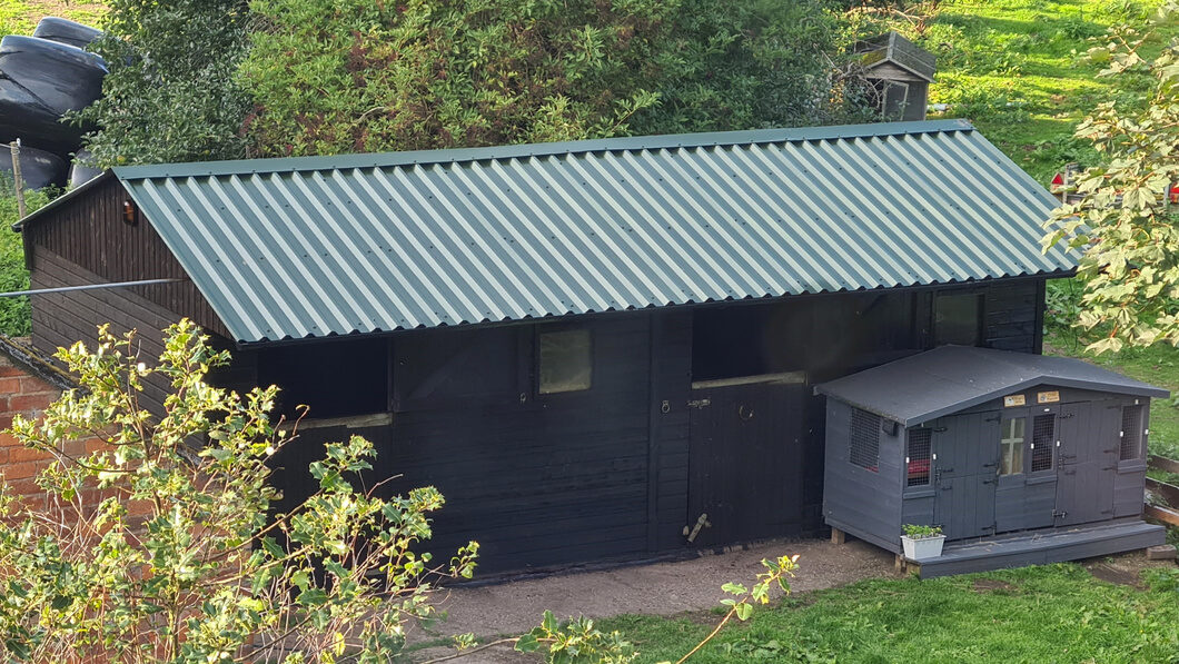 Stable block with Juniper Green roofing sheets