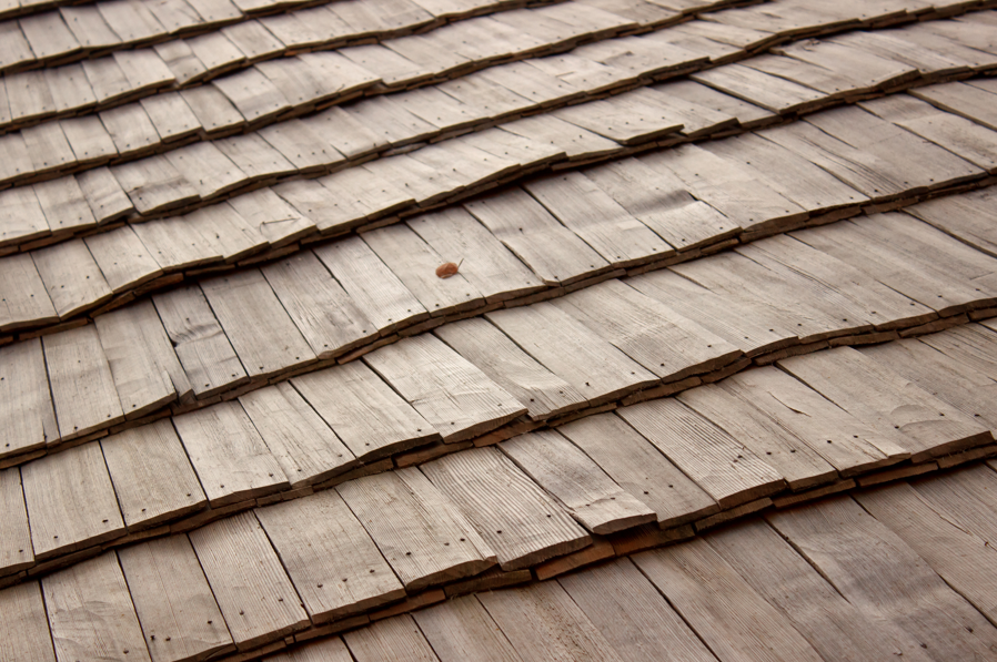 Wood shingles are aesthetically pleasing when adding to garden shed roofs