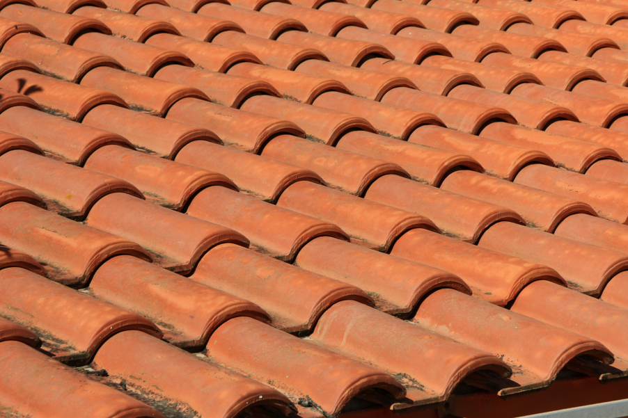 Clay tiles are long-lasting and weather-resistant, used for centuries on roofs
