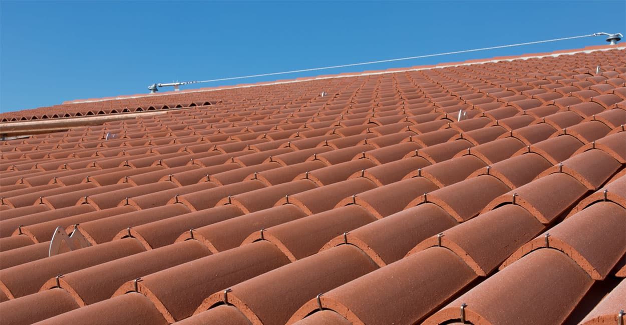 Clay roof pitches are very popular for their aesthetic appeal in the UK. The minimum pitch for clay is 30 degrees.