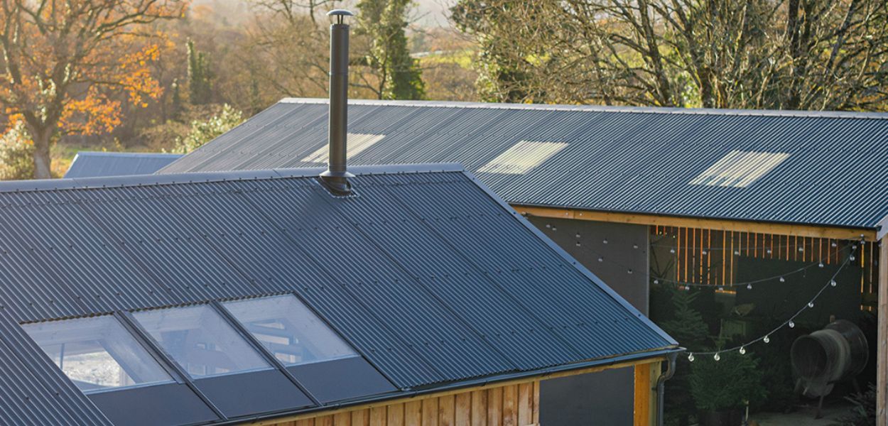 Metal roofing sheets on modern barns