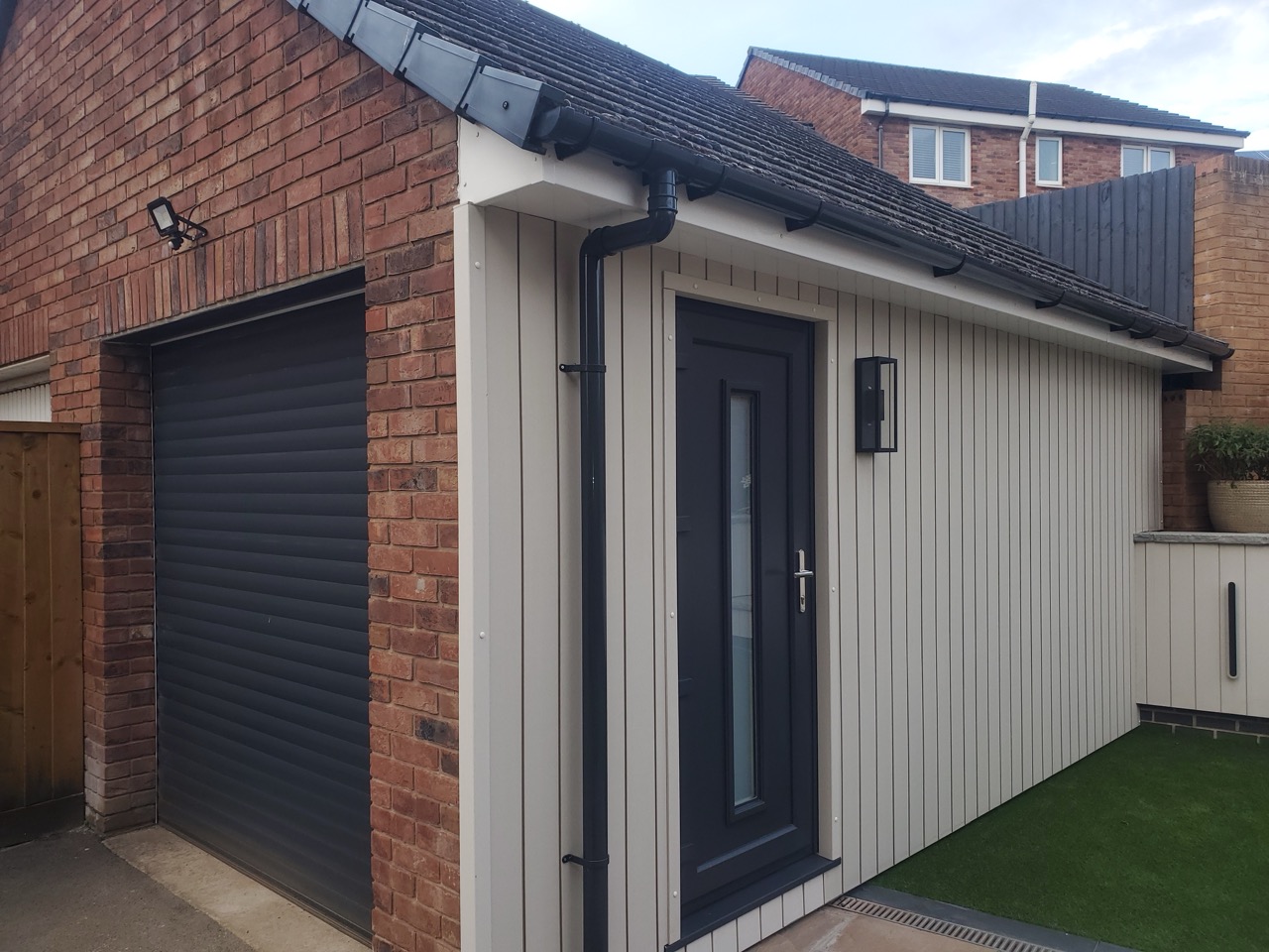 Ivory composite cladding boards with red brick