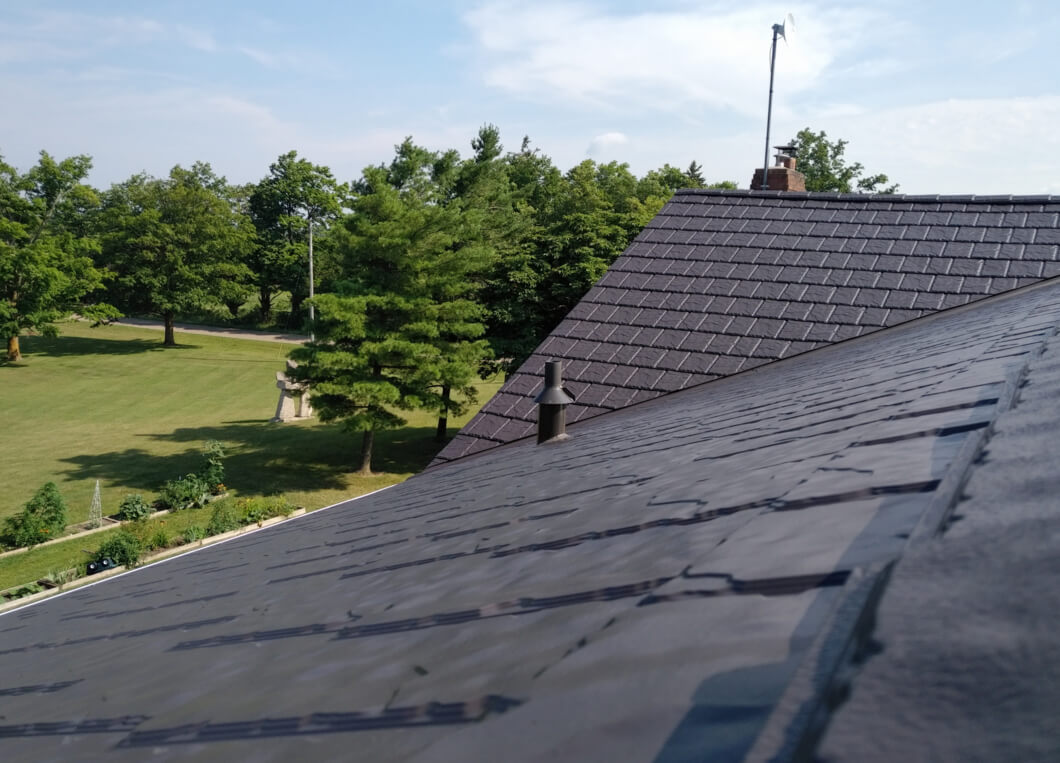 Metal slate roof