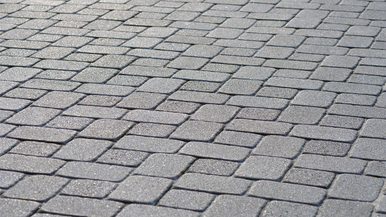 Concrete can be poured and used to recreate the look of individual stone tiles