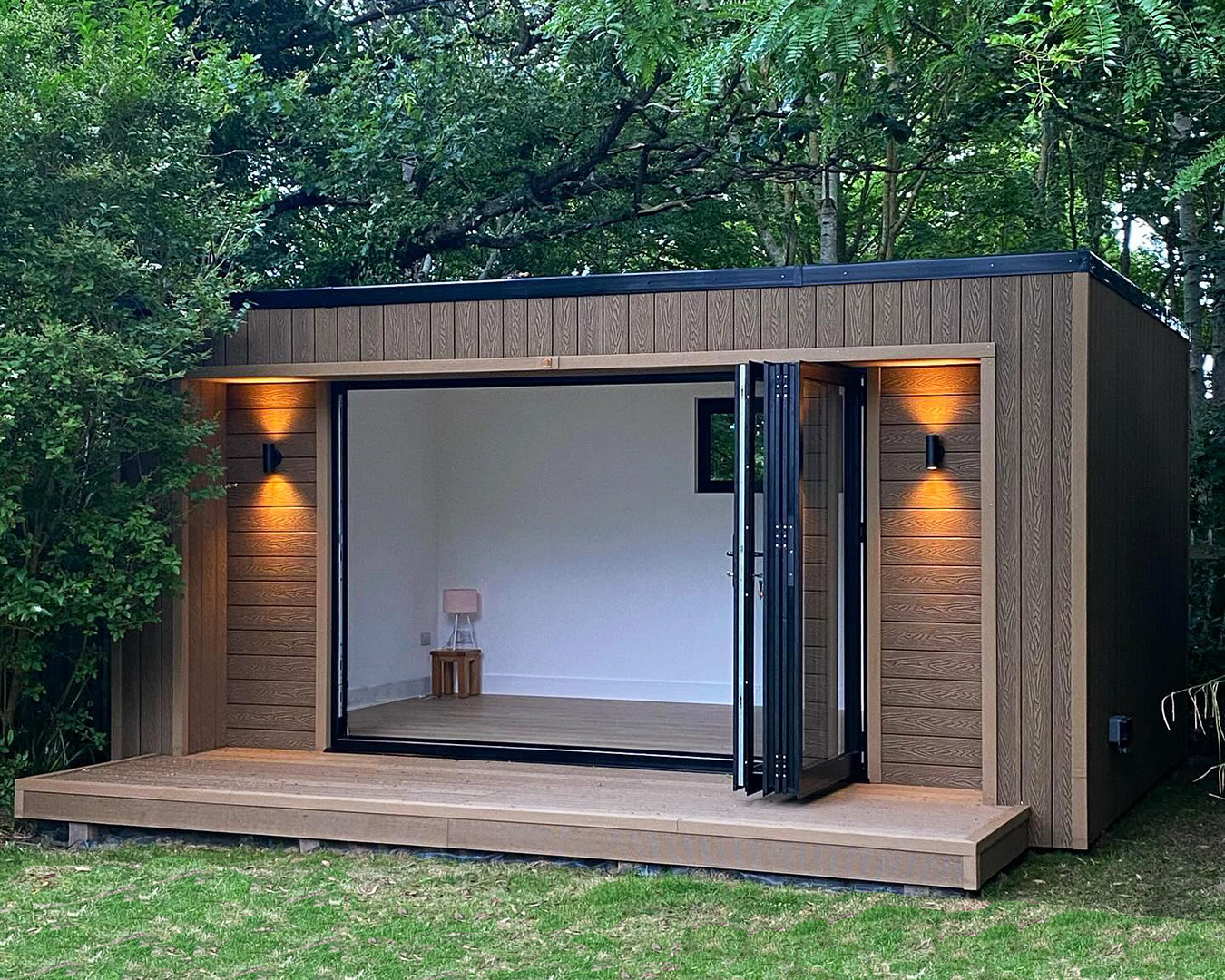 Garden room in teak coloured composite cladding