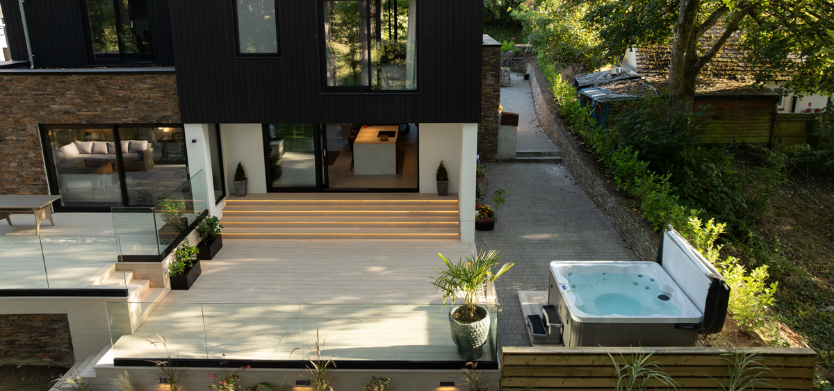 Wide view of Cornish property with Millboard® Enhanced Grain limed oak decking installed by Dale Chadwick Carpentry