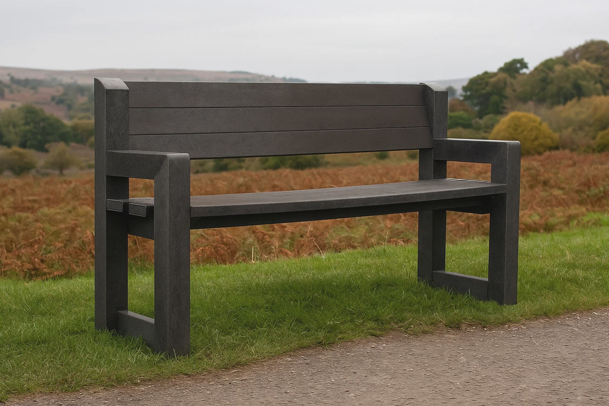 Recycled plastic park bench in a rural landscape, representing the environmental and long-term benefits of recycled plastic benches.